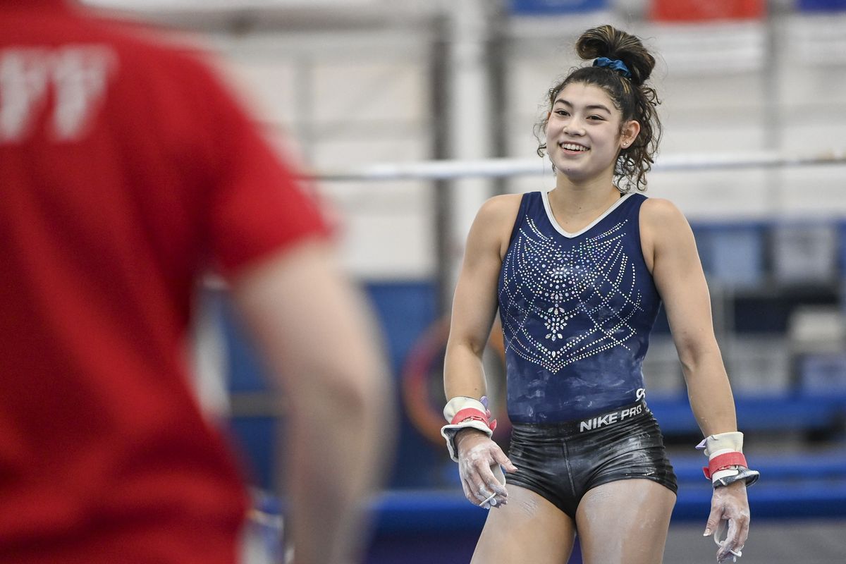 Gymnast Kayla DiCello talks with her coach, Kelli Hill, at Hill’s Gymnastics in Gaithersburg, Md., as she prepares for the upcoming Olympic Trials.  (Jonathan Newton/Washington Post)