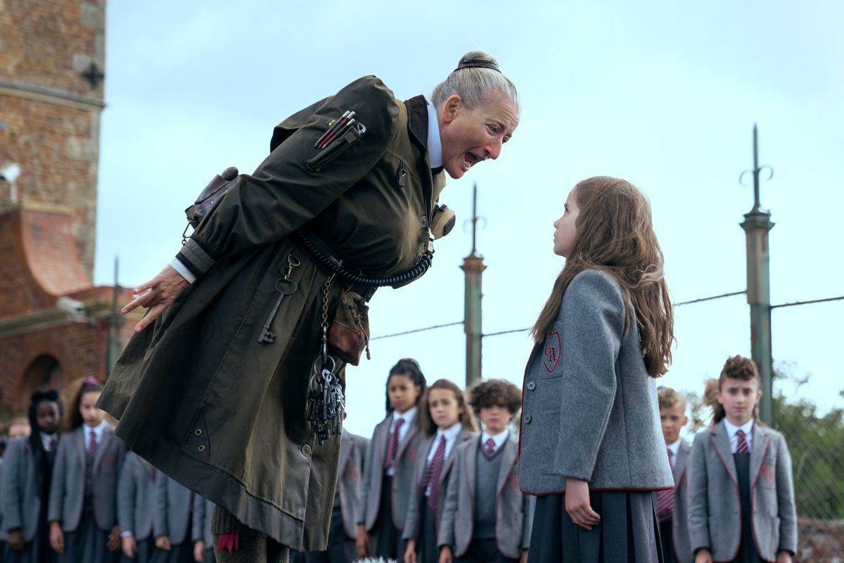 Emma Thompson, left, stars as Miss Trunchbull and Alisha Weir stars as Matilda Wormwood in “Roald Dahl’s Matilda: The Musical.”  (Netflix)