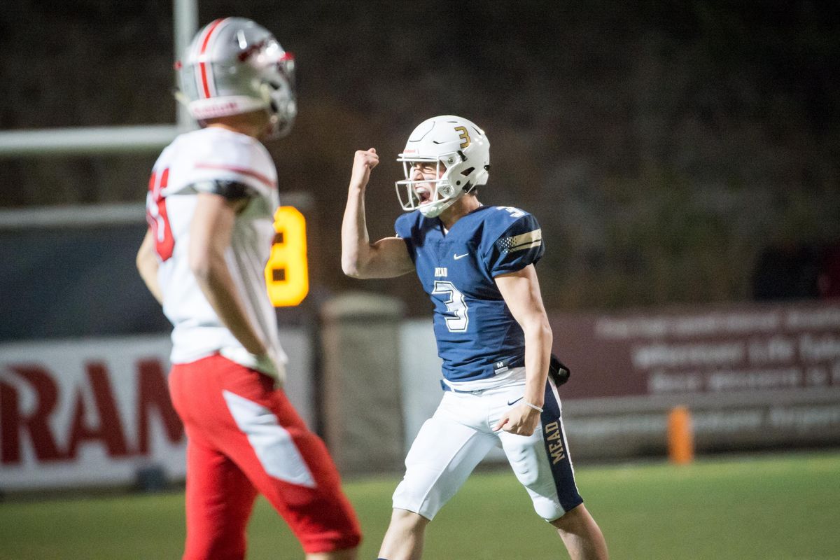 QB Ryan Blair of Mead High School celebrates their title win during a 4A GSL title game against Ferris High School at Joe Albi Stadium on Nov. 1, 2019. The Mead Panthers beat the Ferris Saxons 21-16. (Libby Kamrowski / The Spokesman-Review)