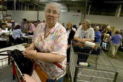 
Shirley Mount waited in line for over an hour to receive a flu shot at Costco in Spokane Valley. With a limited supply of the flu vaccine available this year, hundreds of people, mostly seniors, flooded the store for a chance to be vaccinated Thursday. 
 (Colin Mulvany / The Spokesman-Review)