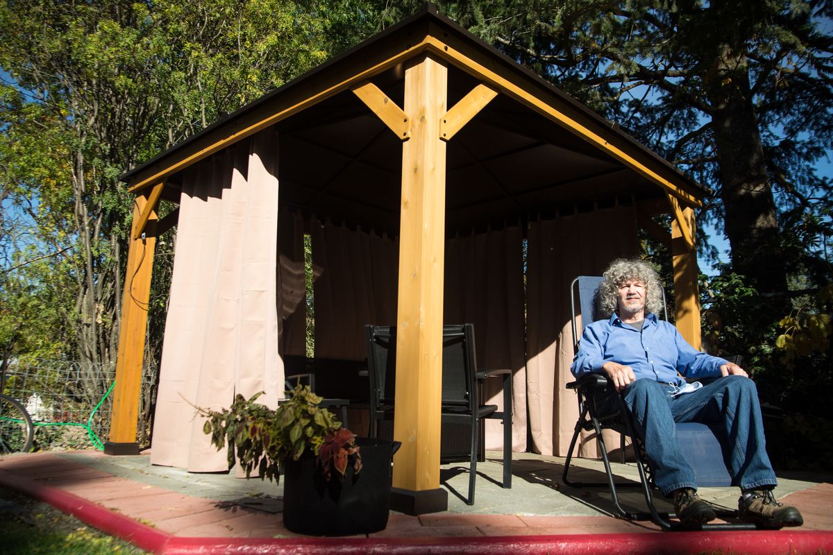 Bob Boyce is photographed at the backyard gazebo Oct. 15, 2020, at his north Spokane home. The gazebo covers a formerly weed-filled vegetable garden.  (Libby Kamrowski/ THE SPOKESMAN-REVIEW)