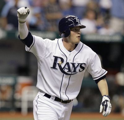 Tampa Bay’s Reid Brignac celebrates after hitting a walk-off home run for the game’s only run vs. Yankees. (Associated Press)
