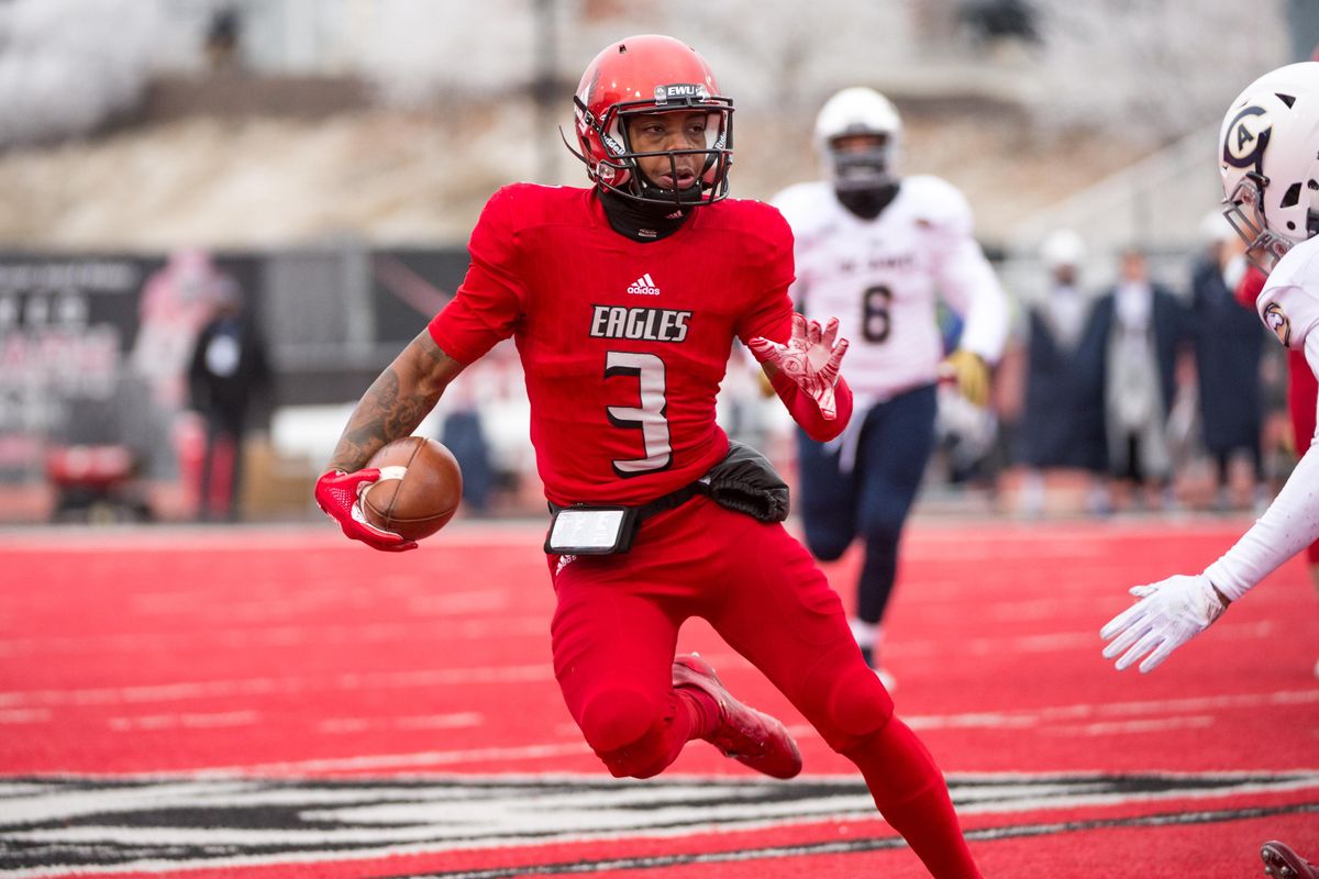 Quarterback Eric Barriere (3) of Eastern Washington University carries the ball upfield in an FCS quarterfinal game against UC Davis at Roos Field in Cheney, Wash. on Dec. 8, 2018. The Eagles beat the Aggies 34-29 and Barriere gained 29 rushing yards. (Libby Kamrowski / The Spokesman-Review)