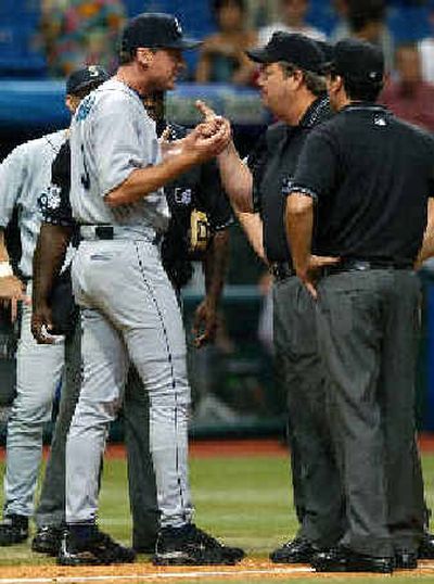 
Seattle manager Bob Melvin, argues in vain with umpire crew chief Joe West. 
 (Associated Press / The Spokesman-Review)