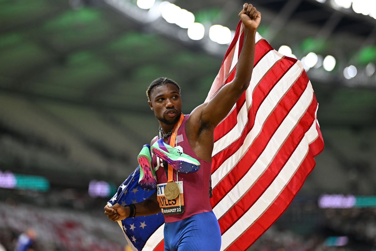 Team USA’s Noah Lyles celebrates after winning the men’s 200-meter final during the World Athletics Championships at the National Athletics Centre in Budapest, Hungary, on Aug. 25.  (Tribune News Service)