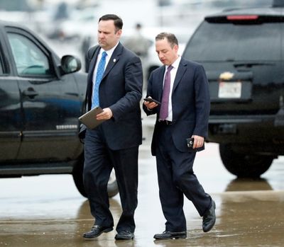 White House Director of Social Media Dan Scavino, left, walks with former White House Chief of Staff Reince Priebus steps off Air Force One as they arrive Friday, July 28, 2017, at Andrews Air Force Base, Md. Trump says Homeland Secretary Secretary John Kelly is his new White House chief of staff. (AP Photo/Alex Brandon) 