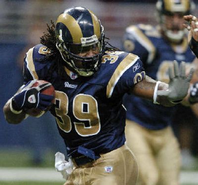 
St. Louis Rams' Steven Jackson rushed for 150 yards against the Redskins on Sunday.  
 (Associated Press / The Spokesman-Review)