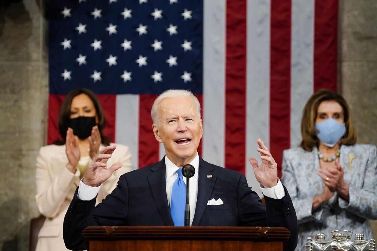 Vice President Kamala Harris, and House Speaker Nancy Pelosi of Calif., stand and applaud as President Joe Biden addresses a joint session of Congress, Wednesday, April 28, 2021, in the House Chamber at the U.S. Capitol in Washington.  (Melina Mara)