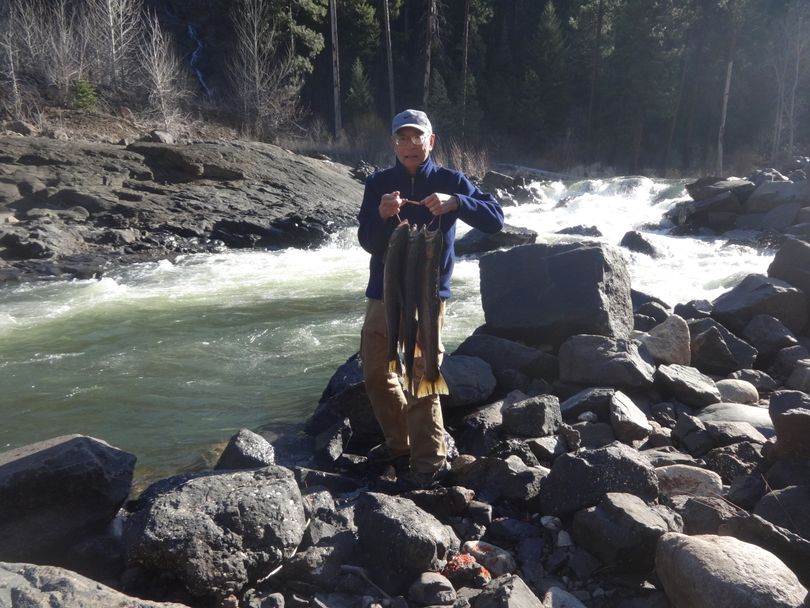 An Idaho Fish and Game conservation officer snapped this photo of Rick Itami with his steelhead. (Dennis Brandt )