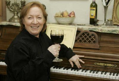 
Steph Waller poses for a photo with a glass of box wine in her home in Stillwater, Okla. 
 (Associated Press / The Spokesman-Review)