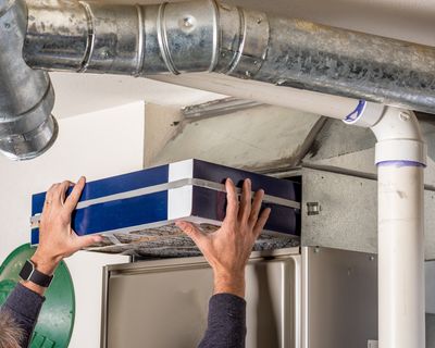 Replace filters regularly to keep your furnace working efficiently. (Shutterstock)