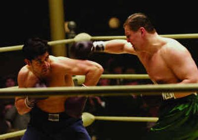 
Russell Crowe, left, portrays James J. Braddock, who entered the boxing ring to provide for his family during the Great Depression – and became a national hero – in 