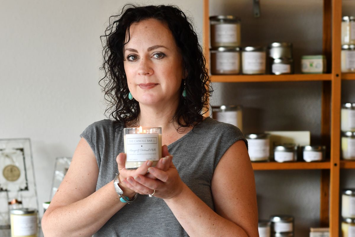 Holli Brown, owner of The Candle Bar Co.,  (TYLER TJOMSLAND)