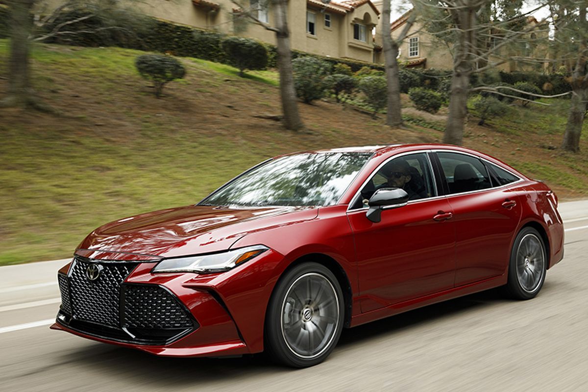Though classified by the EPA as a midsize car, the Avalon’s roomy cabin invites comparison with the large-car segment.  (Toyota)
