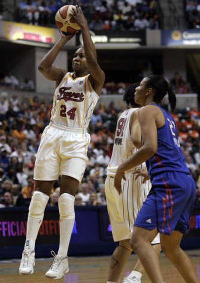 
Associated Press Tamika Catchings leads Fever past Plenette Pierson, right, and Shock.
 (Associated Press / The Spokesman-Review)