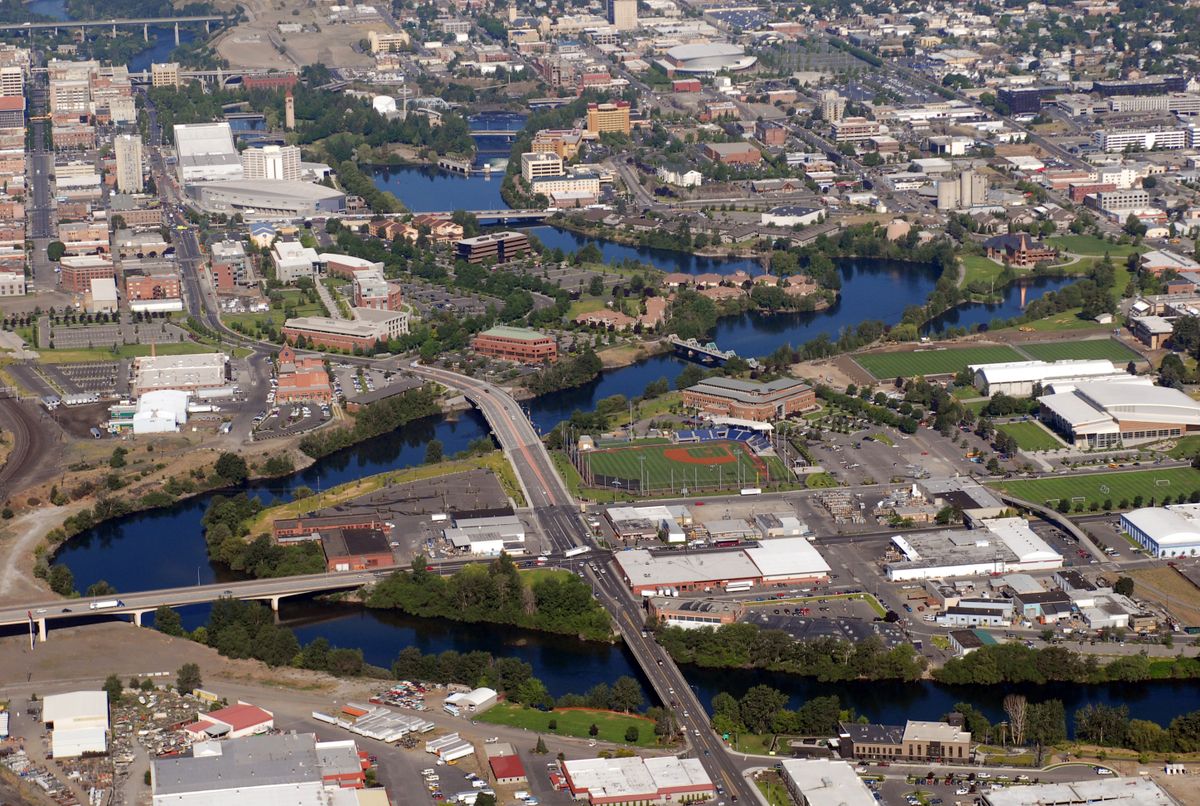 The Spokane River flows into downtown Spokane, zigzagging around Gonzaga University, in the lower right, and new development in downtown’s east end.  (Jesse Tinsley / The Spokesman-Review)
