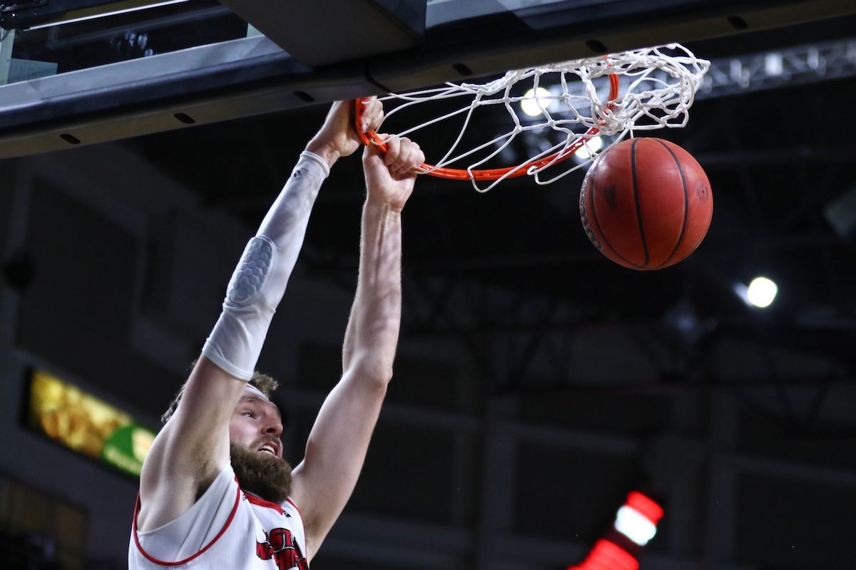 Eastern Washington big man Tanner Groves throws down a dunk against Northern Arizona Thursday in Boise at the Big Sky Conference basketball tournament.  (Brooks Nuanez/Courtesy)
