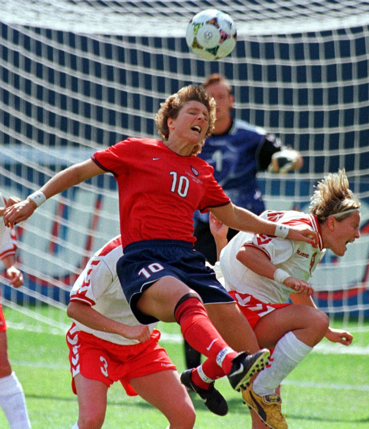 Michelle Akers, center, scored 105 goals in 153 matches for the United States women’s soccer team.  (Associated Press)