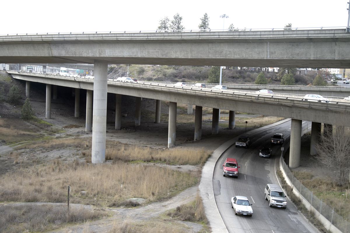 Interstate 90 runs through a ravine, past a rocky hillside that made up most of Liberty Park, one of Spokane