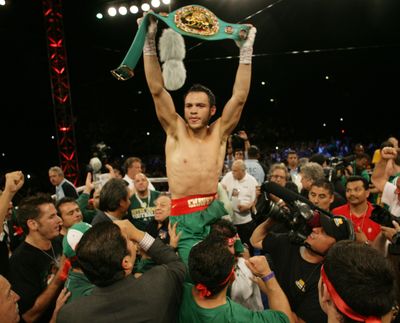 Julio Cesar Chavez Jr. celebrates his victory over Andy Lee in title bout. (Associated Press)