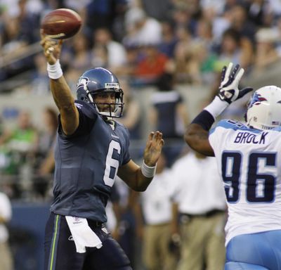 After an impressive preseason game against Tennessee, Charlie Whitehurst eased into his familiar role.  (Associated Press)