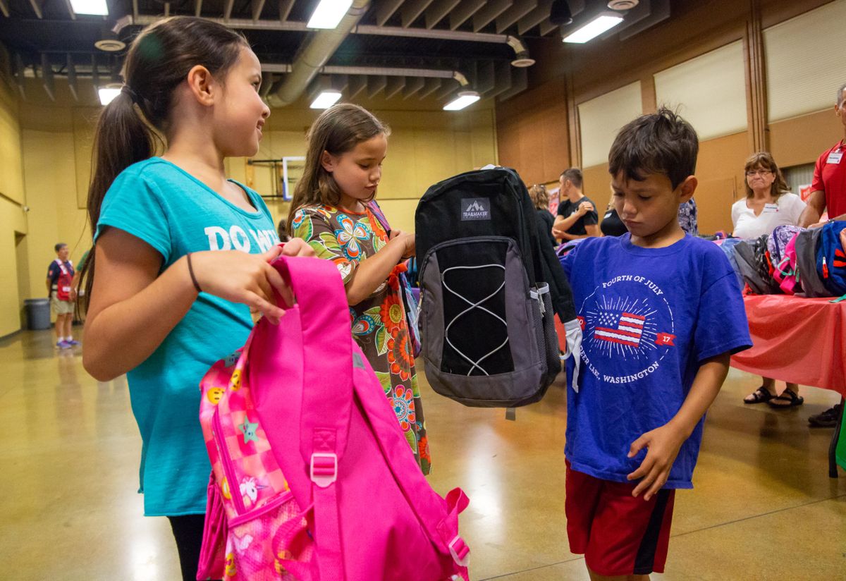 Salvation Army backpack distribution Aug. 15, 2018 The SpokesmanReview