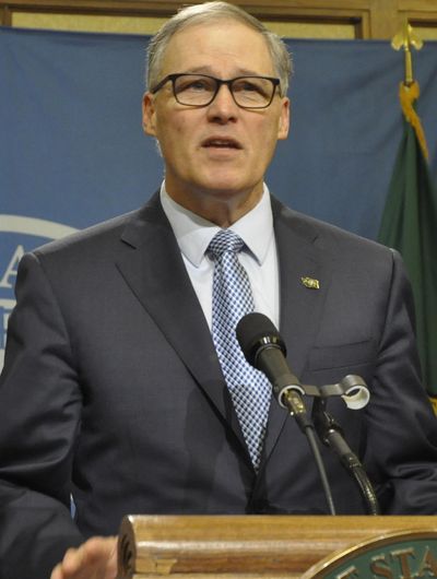 OLYMPIA – Gov. Jay Inslee, seen here at a press conference earlier this month in his conference room, will speak this week to the United Nations and the World Economic Forum (Jim Camden / The Spokesman-Review)