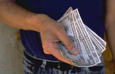 
After you've determined your budget, make your recipient list. Note a few gift ideas beside each name and the dollar amount you can't exceed for each one.
 (clipart.com / The Spokesman-Review)