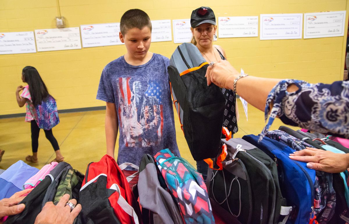 Salvation Army backpack distribution Aug. 15, 2018 The SpokesmanReview