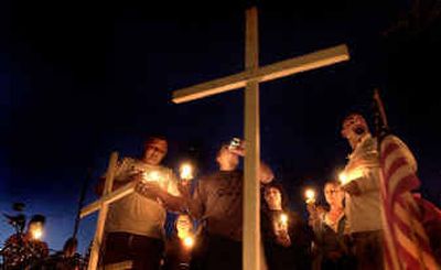 
Friends and family of Donnie Corey and Thomas N. Morris gather in a party spirit Monday night to remember the young men's lives a year after their deaths. 
 (Brian Plonka / The Spokesman-Review)