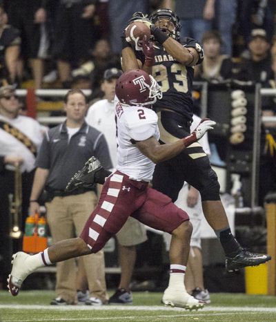 Defenders will have a difficult assignment with Idaho receiver/tight end Deon Watson (83). (Dean Hare / Associated Press)