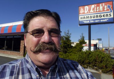 David Lish, owner of D. Lish’s Hamburgers, posed for a photo at his North Division Street burger joint in 2004.  Lish, 64, died last week.  (FILE / The Spokesman-Review)