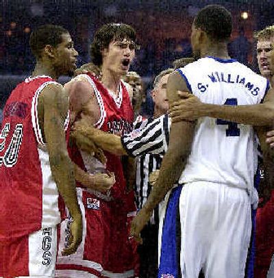 Tempers have flared at times this year when Adam Morrison gets involved, witness this altercation against Memphis.
 (File/Associated Press / The Spokesman-Review)