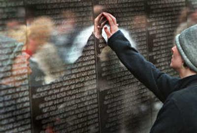 
The black granite of the Vietnam Veterans Memorial is inscribed with the names of  American lives lost during the Vietnam War. Associated Press
 (File Associated Press / The Spokesman-Review)