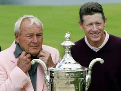 
Mike Reid, right, poses with Arnold Palmer after winning the 66th Senior PGA Championship at Laurel Valley Golf Club. 
 (Associated Press / The Spokesman-Review)
