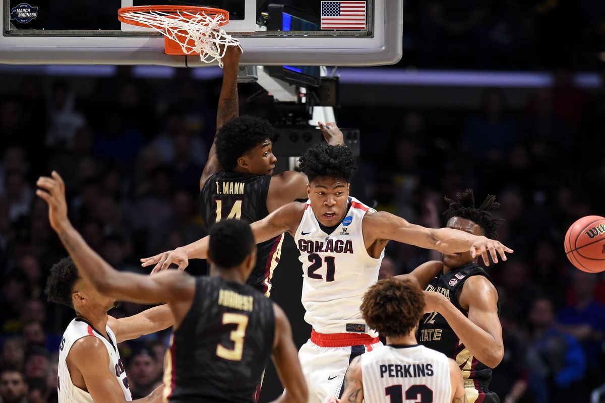 Gonzaga’s Rui Hachimura (21) vies for a rebound in a crowd during the loss to Florida State. (Tyler Tjomsland / The Spokesman-Review)