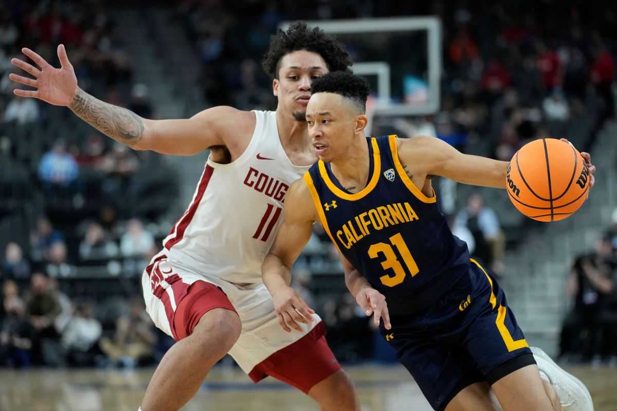 California’s Jordan Shepherd (31) drives around Washington State’s DJ Rodman (11) during the second half of an NCAA college basketball game in the first round of the Pac-12 tournament Wednesday, March 9, 2022, in Las Vegas. (AP Photo/John Locher)  (John Locher)
