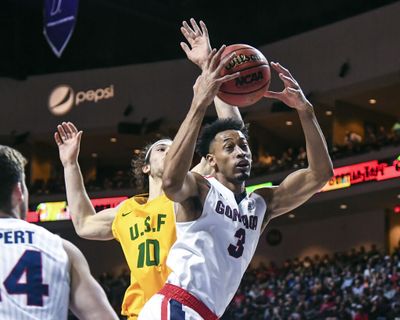 Gonzaga forward Johnathan Williams snags a rebound against San Francisco forward Matt McCarthy, Monday, March 5, 2018, during the West Coast Conference Tournament at the Orleans Arena in Las Vegas.  (DAN PELLE/The Spokesman-Review)