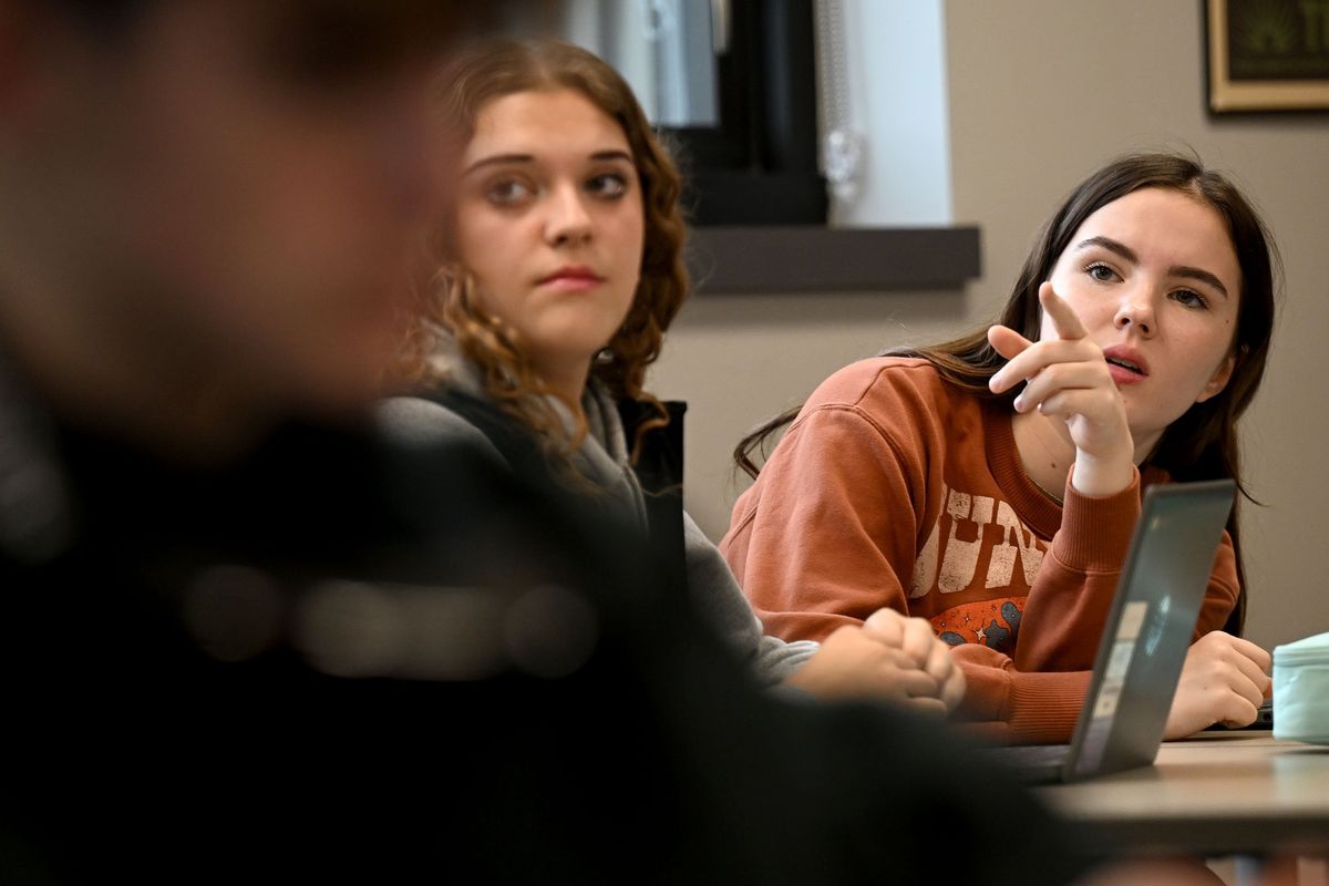 Ridgeline High School students Carolyn Rose, left, and Alexis Hochberg work on an AI project Thursday at the school in Liberty Lake.  (KATHY PLONKA/THE SPOKESMAN-REVIEW)