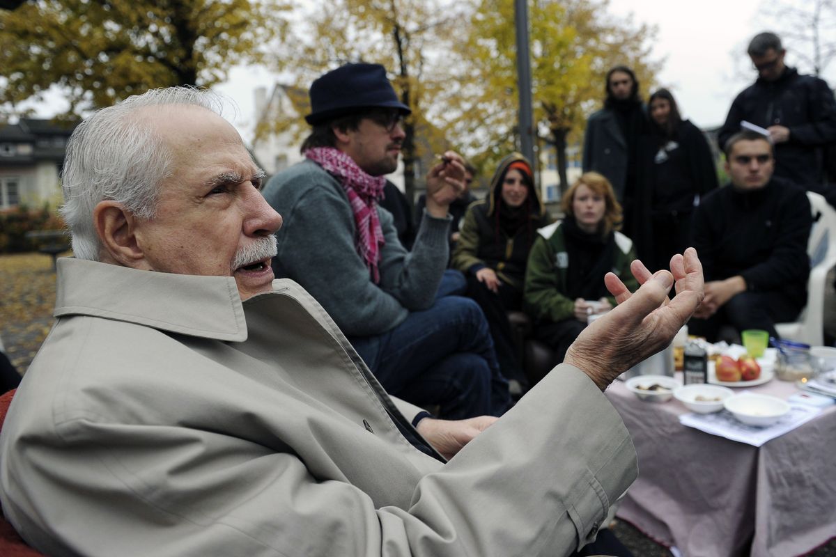 FILE - Former Democratic U.S. senator Mike Gravel gestures while talking to "Occupy" activists at Lindenhof square in Zurich, Switzerland, in this Monday, Oct. 31, 2011, file photo. Gravel, a former U.S. senator from Alaska who read the Pentagon Papers into the Congressional Record and confronted Barack Obama about nuclear weapons during a later presidential run, has died. He was 91. Gravel, who represented Alaska as a Democrat in the Senate from 1969 to 1981, died Saturday, June 26, 2021. Gravel had been living in Seaside, California, and was in failing health, said Theodore W. Johnson, a former aide. (Steffen Schmidt)