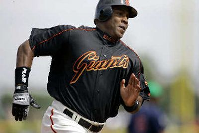 
The Giants' Barry Bonds plans to sue against published steroids allegations. 
 (Associated Press / The Spokesman-Review)