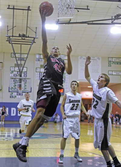 Jake Wiley of Newport uses his size and speed and cuts through the Lakeside defense to score. (Christopher Anderson)