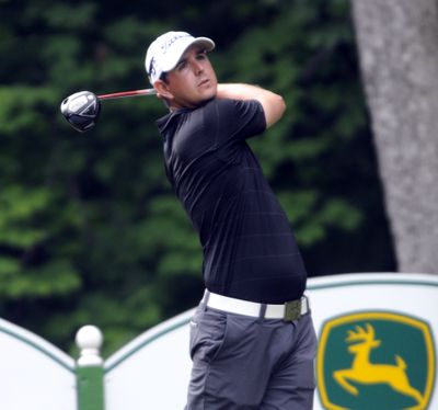 Matt McQuillan follows through on a swing on the 17th hole during Thursday’s first round of the John Deere Classic. (Associated Press)