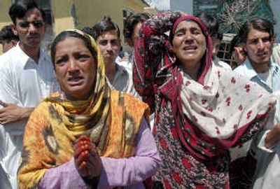 
Women mourn after a suicide bombing Sunday in Matta, in northwest Pakistan. Associated Press
 (Associated Press / The Spokesman-Review)