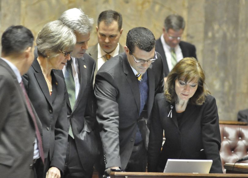 OLYMPIA -- Supporters of charter school legislation watch the vote count Thursday as the Senate votes on SB 6194. From right: Sens. Sharon Brown, Joe Fain, John Braun, Steve Litzow, Linda Evans Parlette and Steve Hobbs.  (Jim Camden/The Spokesman-Review)