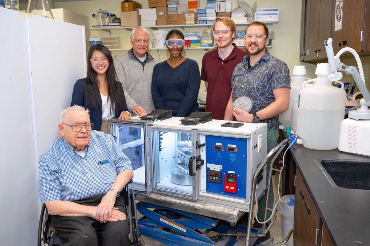 Researchers for Washington State University centrifugal bioreactor include William C. Davis, left, Kitana Kaiphanliam, Bernard Van Wie, Zakora Moore, Brenden Fraser-Hevlin and Eric Barrow.  (Courtesy of Washington State University Voiland School of Chemical Engineering and Bioengineering )