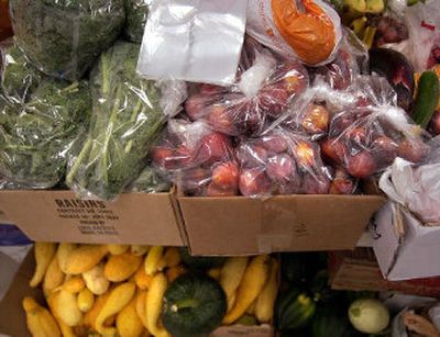 
Pictured are boxes of fresh fruit and vegetables donated to local food banks last year.
 (File/ / The Spokesman-Review)