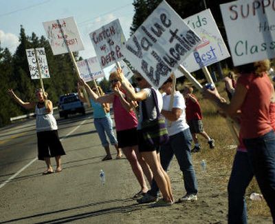 
Riverside School District teachers hold an informational picket Friday afternoon outside Riverside High School after negotiations failed to reach an agreement on a new contract. 
 (Holly Pickett / The Spokesman-Review)