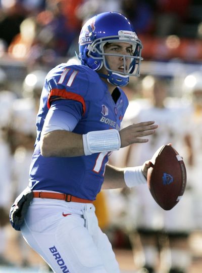 Quarterback Kellen Moore has led Boise State to 49 wins while throwing 140 touchdown passes. (Associated Press)