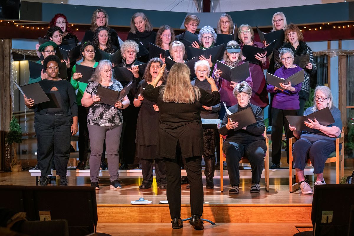Women sing to directions from choir director and composer Janice Mayfield during practice Wednesday at the Unity Spiritual Center.  (COLIN MULVANY /THE SPOKESMAN-REVIEW)